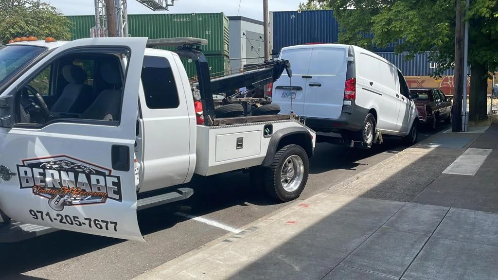 Bernabe Towing vehicles at a commercial property.